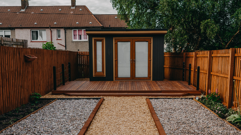 black and wood office shed