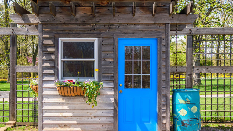 wooden office with blue door