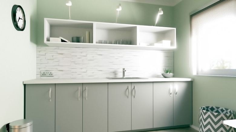 Simple white and green kitchen