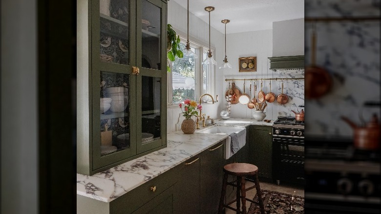 White, green, and copper kitchen