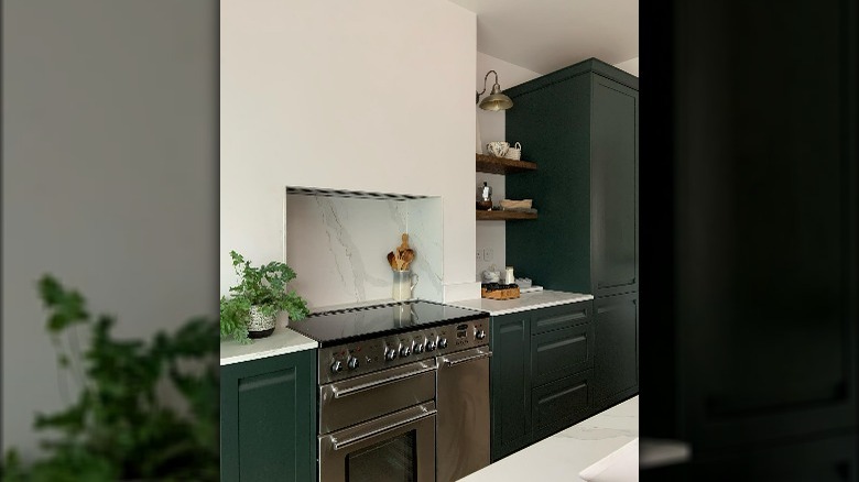 Dark forest green cabinets 