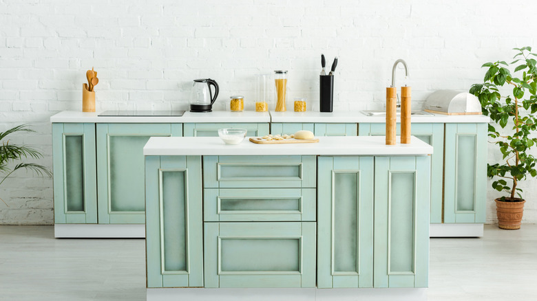 Mint green kitchen cabinets 