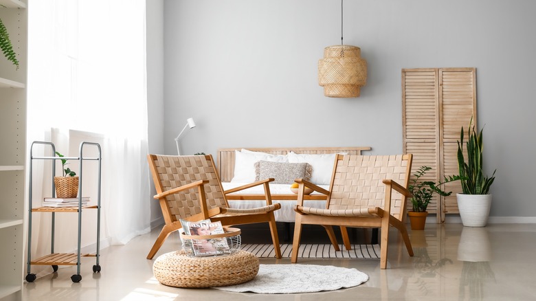 modern bedroom with wicker armchairs