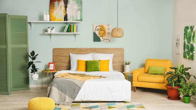 Bedroom with green and yellow decor