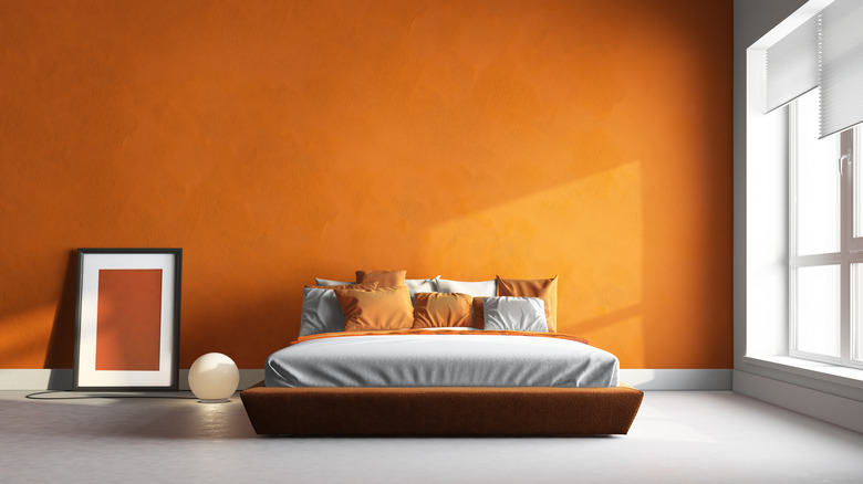 Orange painted bedroom
