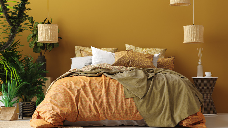 Yellow bedroom with plants
