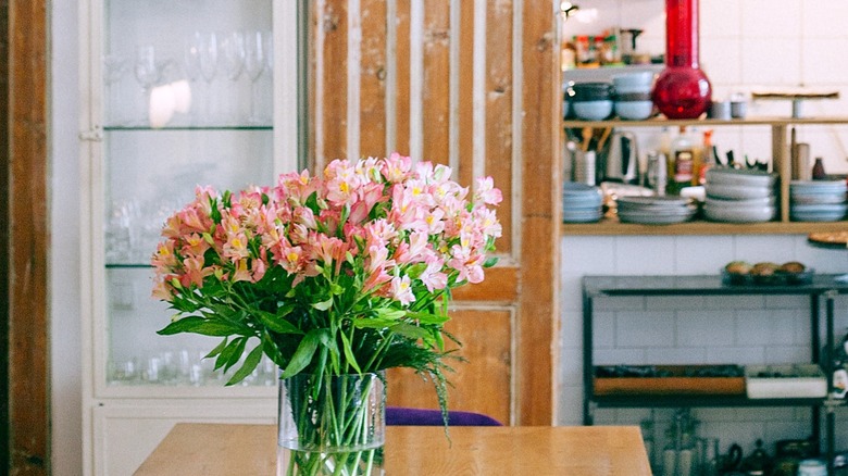 flowers in vase in kitchen