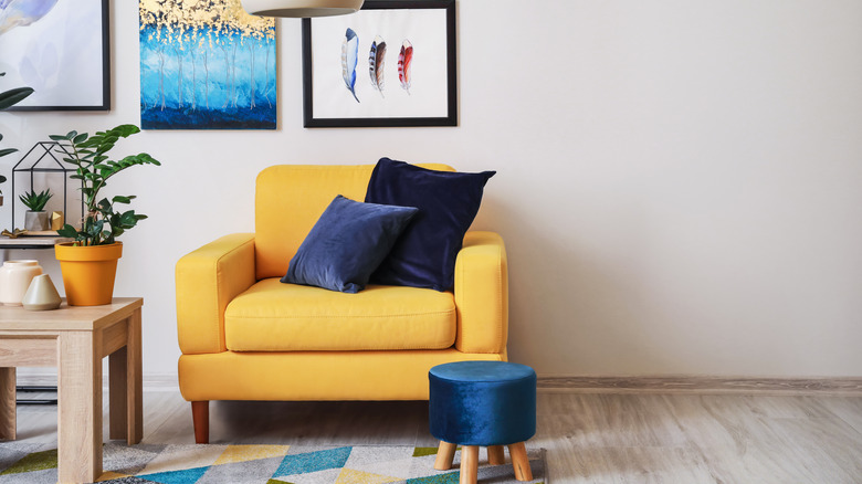 yellow, blue, white pops of color in room