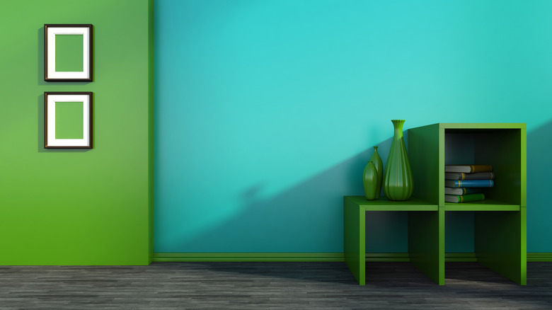 bright green bookcase in green-painted room