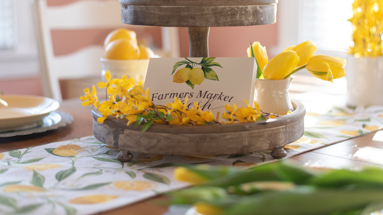 floral tablescape with yellow arrangement