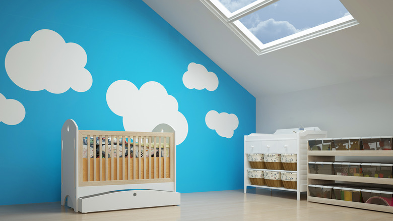 blue nursery with large white clouds