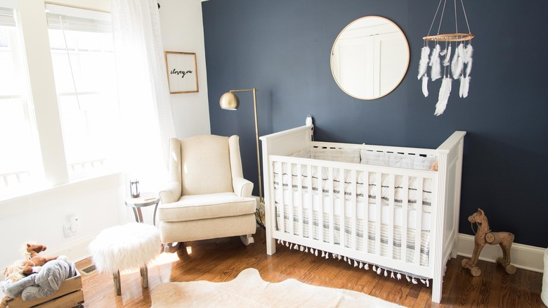 navy blue wall in nursery