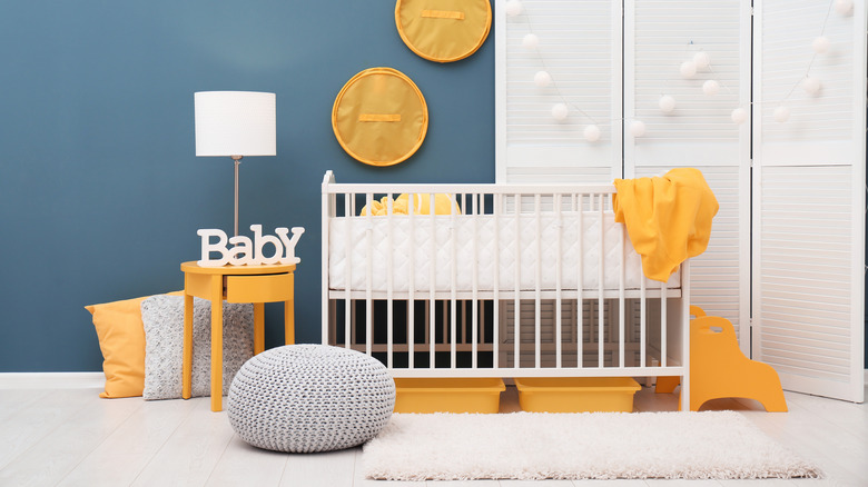 blue nursery with fluffy decor