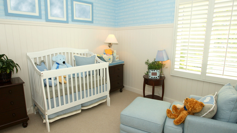 blue nursery with wallpaper