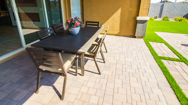 dining table on brick patio