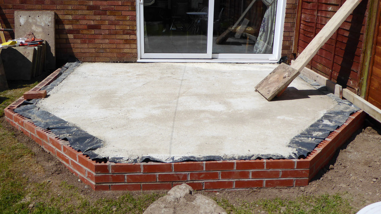Small brick patio being built