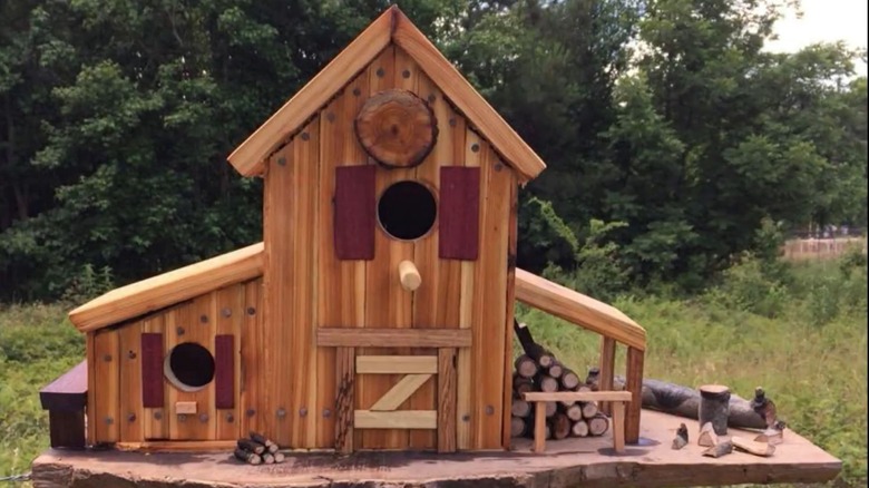 an intricate barn birdhouse