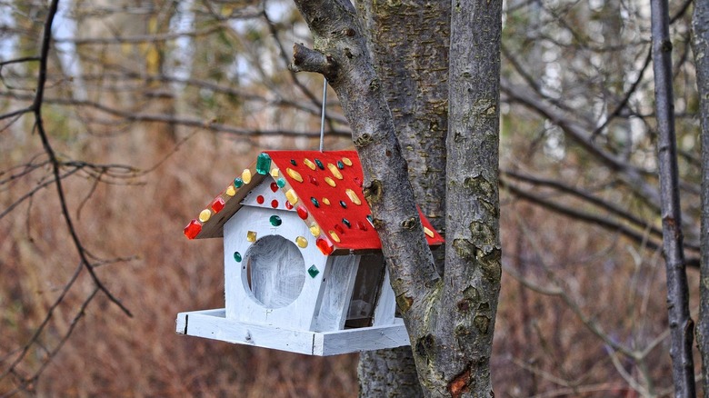colorful bejeweled birdhouse