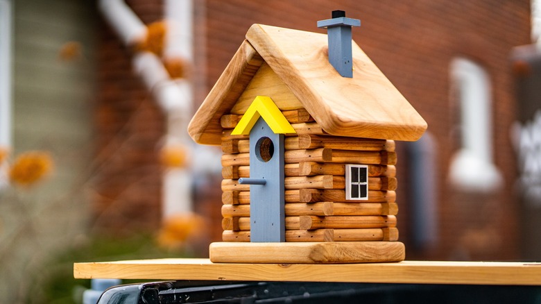 a log cabin birdhouse