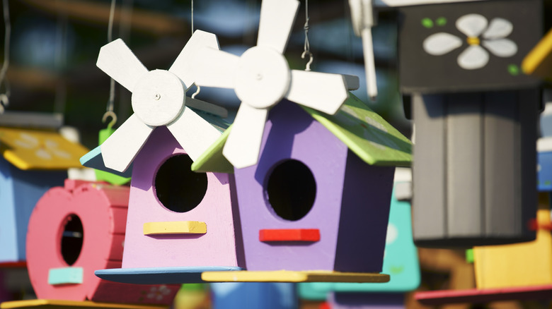 birdhouses with windmills on top