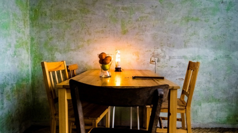 dining table with a bowl of fruit