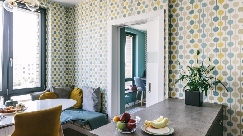 dining room with retro wallpaper