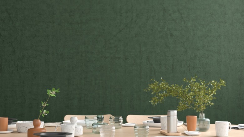  dining room with green wallpaper