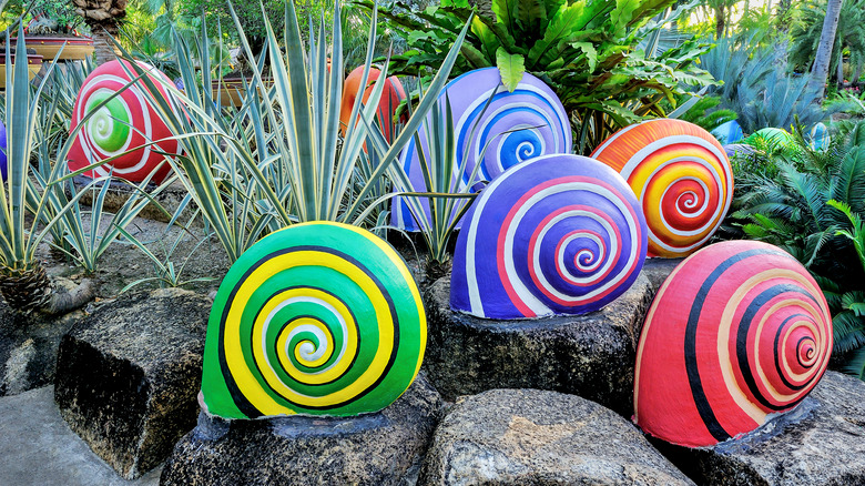 Snails sculptures on rocks