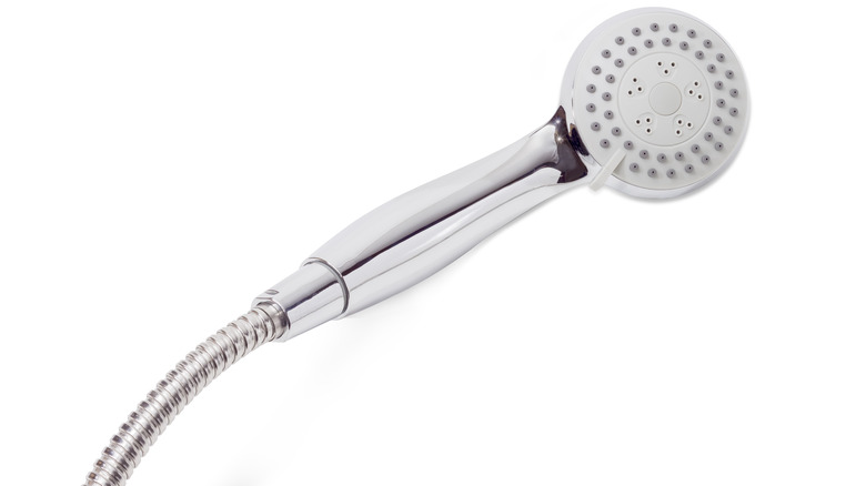 Water-saving shower head with button