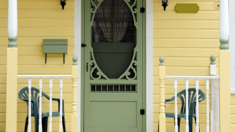 Yellow house with green door