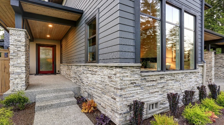 Gray house with stonework