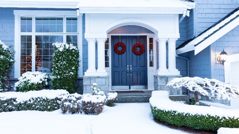 Pale blue house in winter