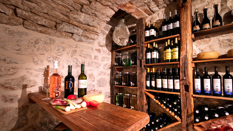 Stone wine cellar with fruit 