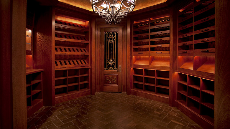 Bright chandelier in wine cellar 