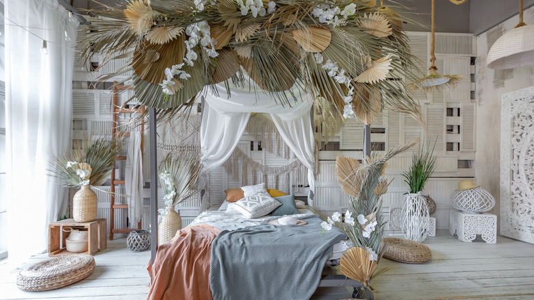 Tropical boho bedroom canopy bed