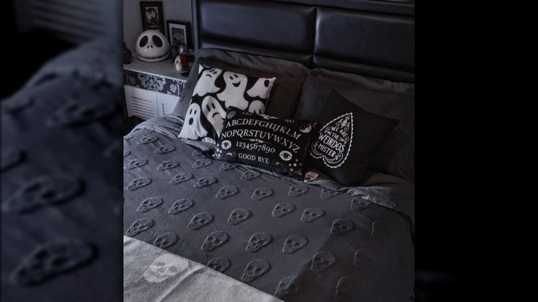 Skull patterned bedspread gothic bedroom