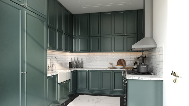 green cabinets in kitchen