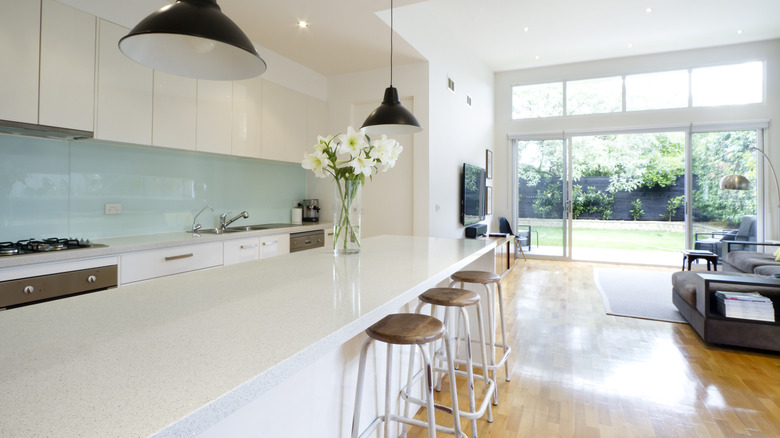 kitchen with sea green backsplash