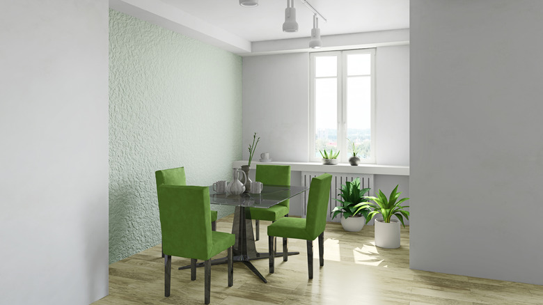 green chairs around a table