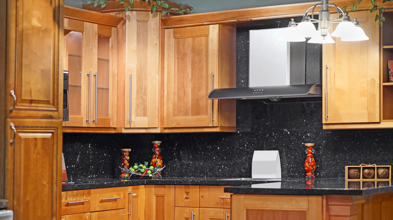 wooden stained cabinets in kitcen