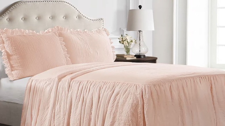 pink bedspread with ruffles
