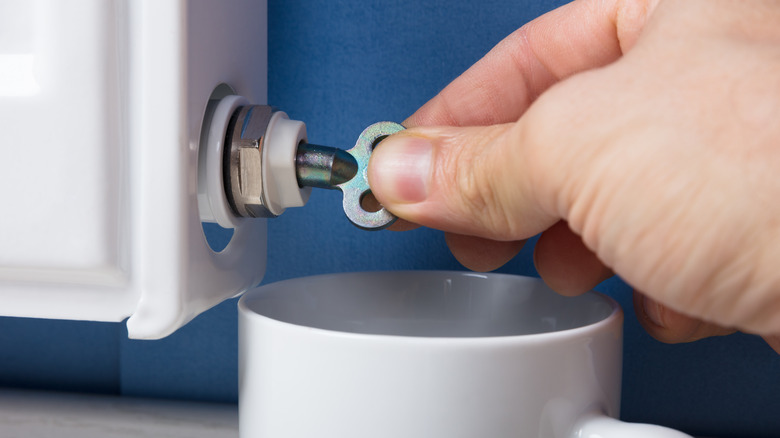 Bleeding radiator into cup