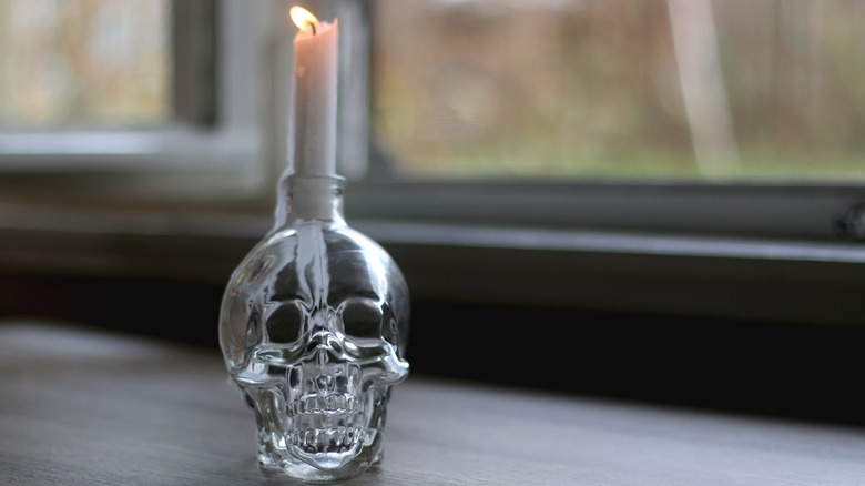 Skull holder with candle