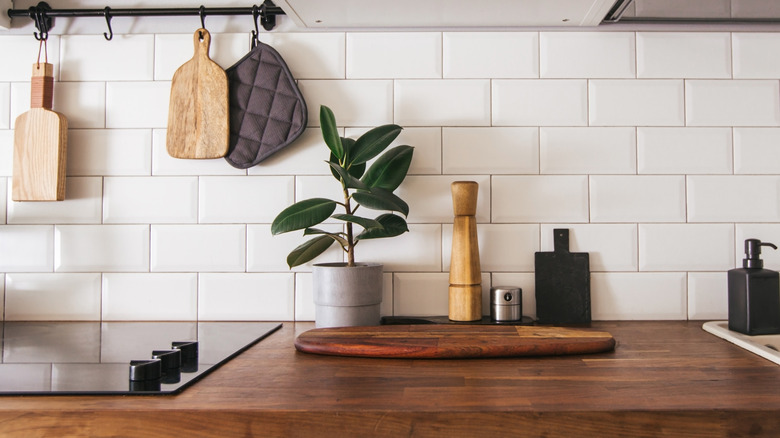 cutting boards hanging above stove