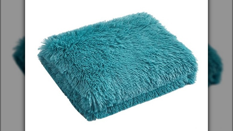 Teal faux fur blanket