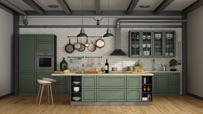 Dark green kitchen cupboards