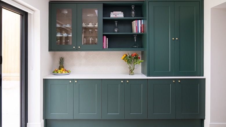 dark green and white kitchen