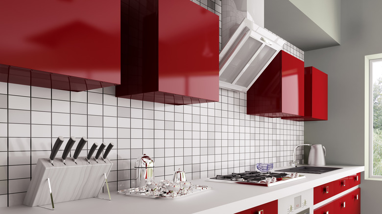 shiny red kitchen cabinets