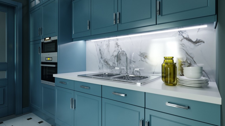 grayish-blue kitchen cabinets