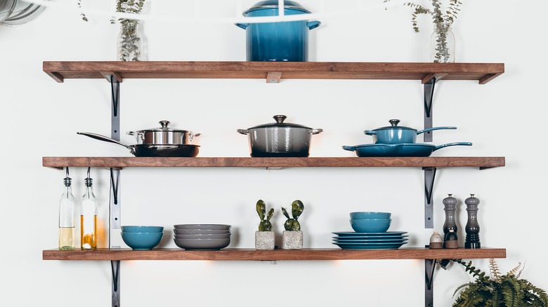 cookware on floating shelves